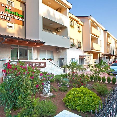 Apartments Maslina II Njivice Buitenkant foto