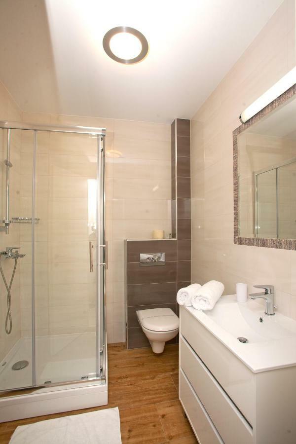 Apartments Maslina II Njivice Buitenkant foto